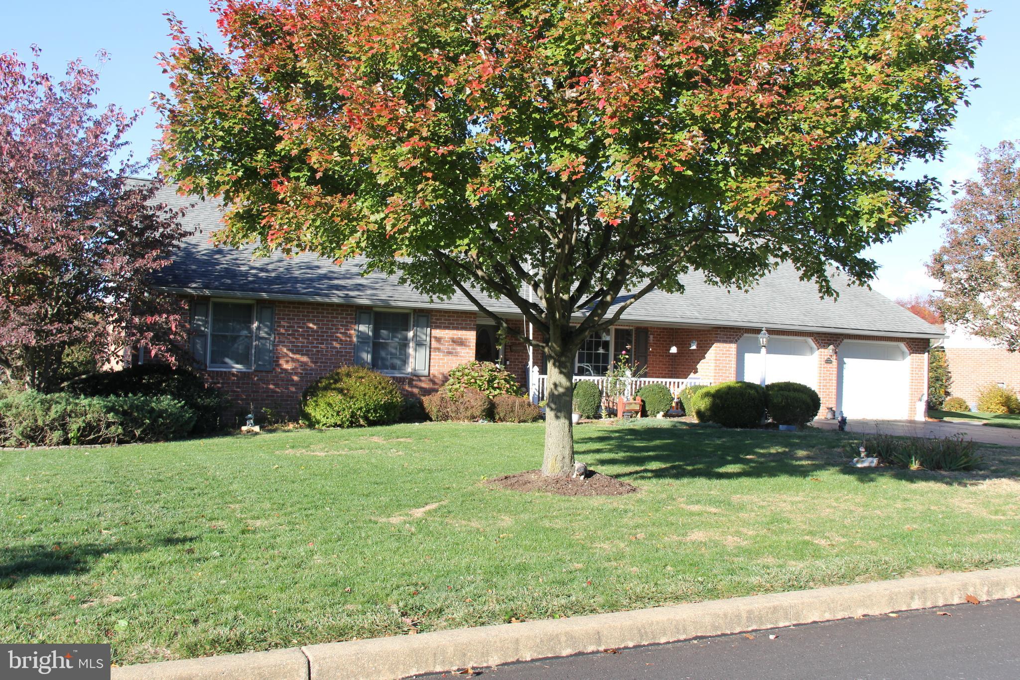 668 Snyder Hill Road Lititz, PA 17543 - Photo 3 of 32 a front view of a house with a yard