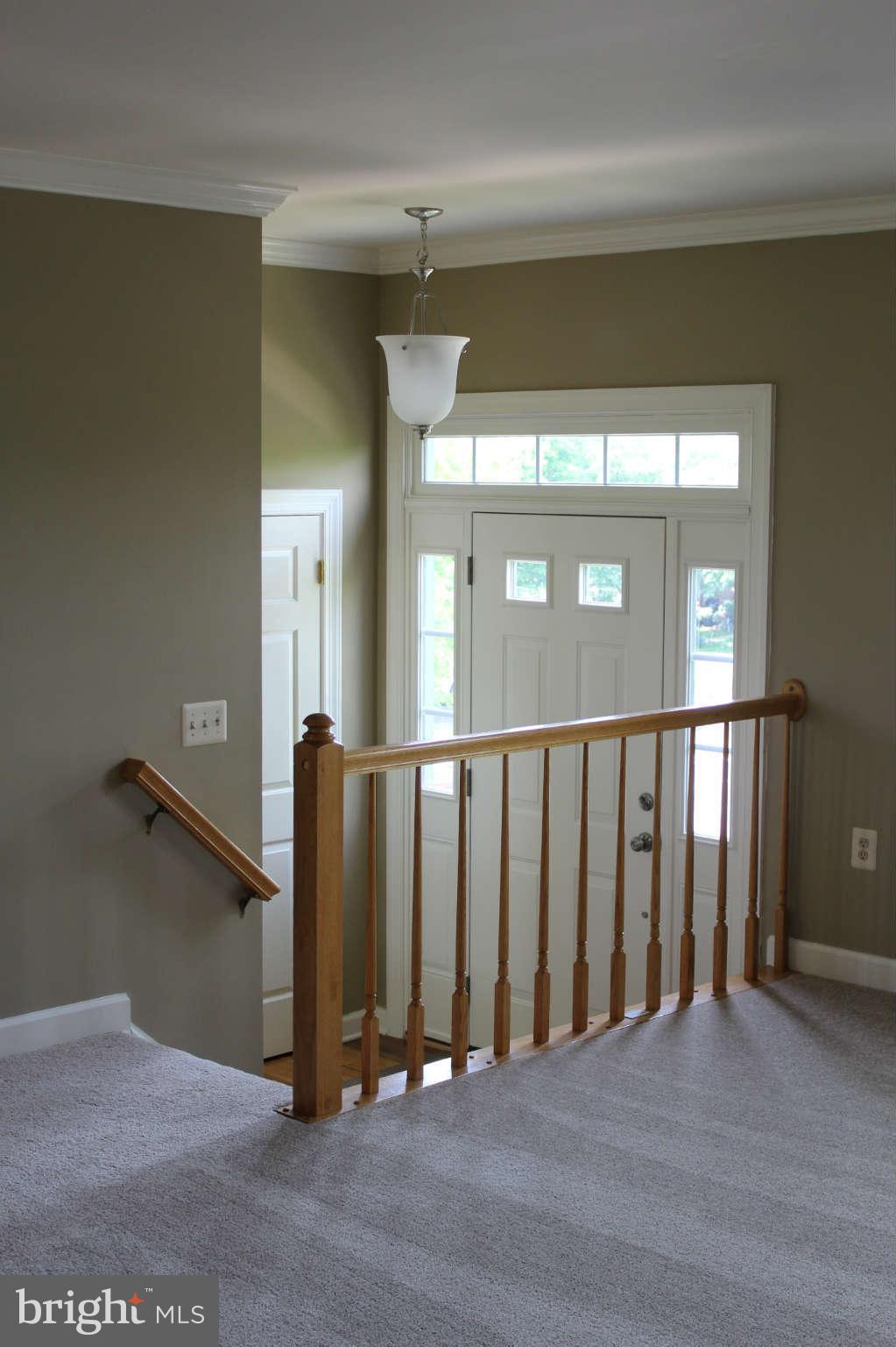 5554 Rivendell Place Frederick, MD 21703 - Photo 3 of 27 Foyer has hardwood floor