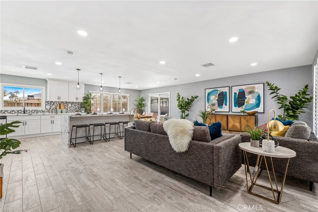 373 East Simms Road Palm Springs, CA 92262 - Photo 11 of 24 a living room with furniture and a kitchen area