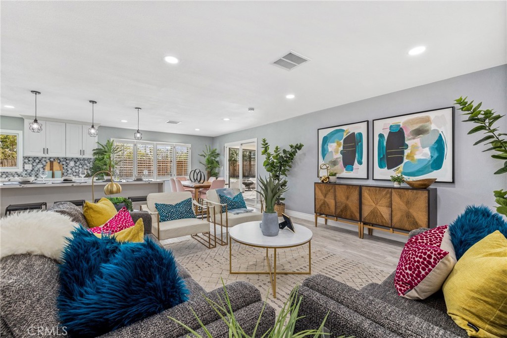 373 East Simms Road Palm Springs, CA 92262 - Photo 12 of 24 a living room with furniture and a wooden floor