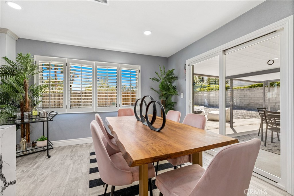 373 East Simms Road Palm Springs, CA 92262 - Photo 17 of 24 a view of a dining room with furniture window and outside view