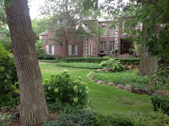 329 Scottswood Road Riverside, IL 60546 - Photo 2 of 2 a view of a brick house with a big yard and large tree