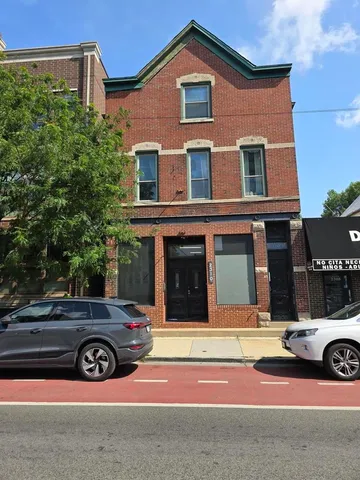 a car parked in front of a house