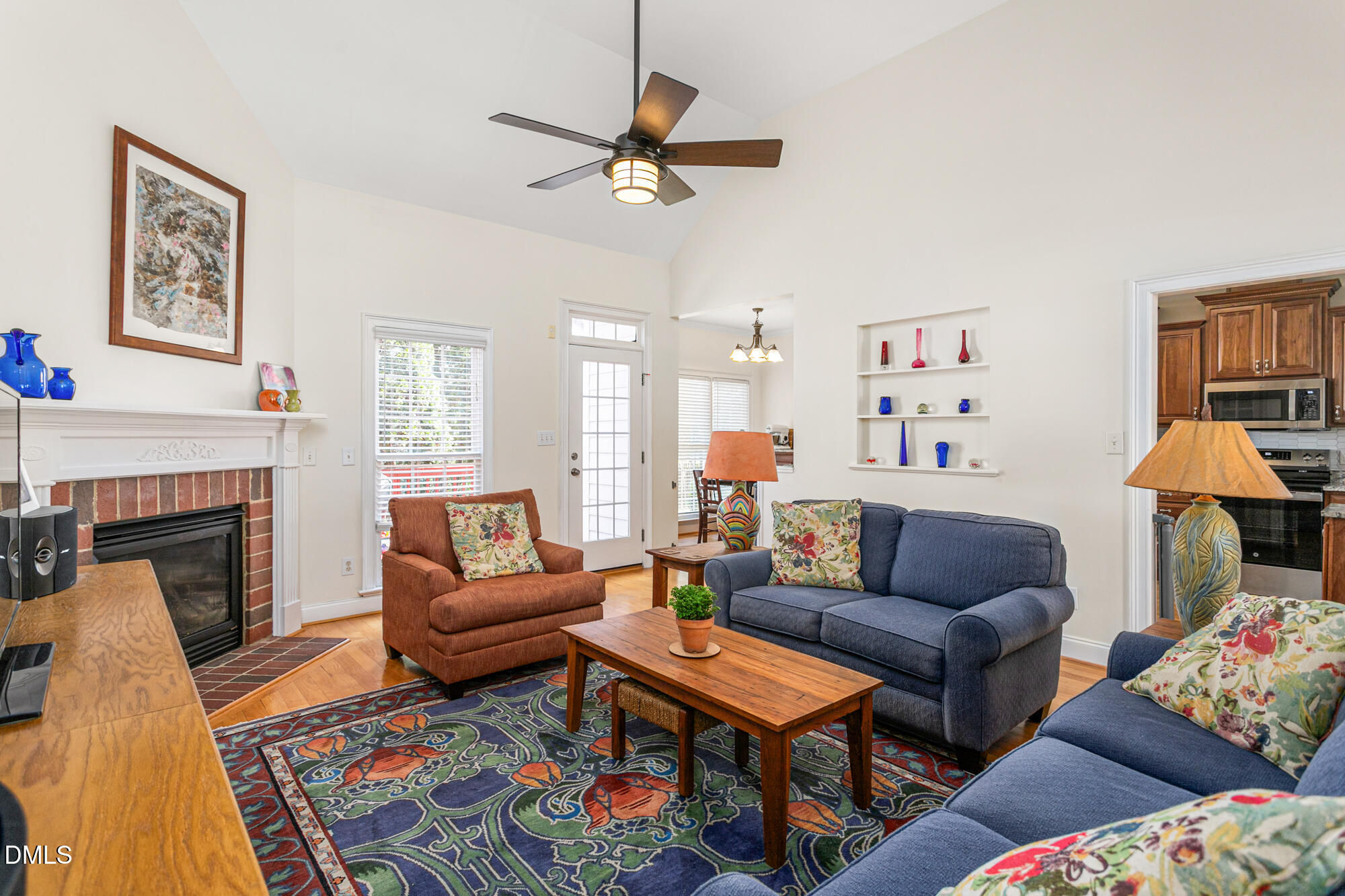 7 Powder Springs Place Durham, NC 27712 - Photo 11 of 44 a living room with furniture and a fireplace