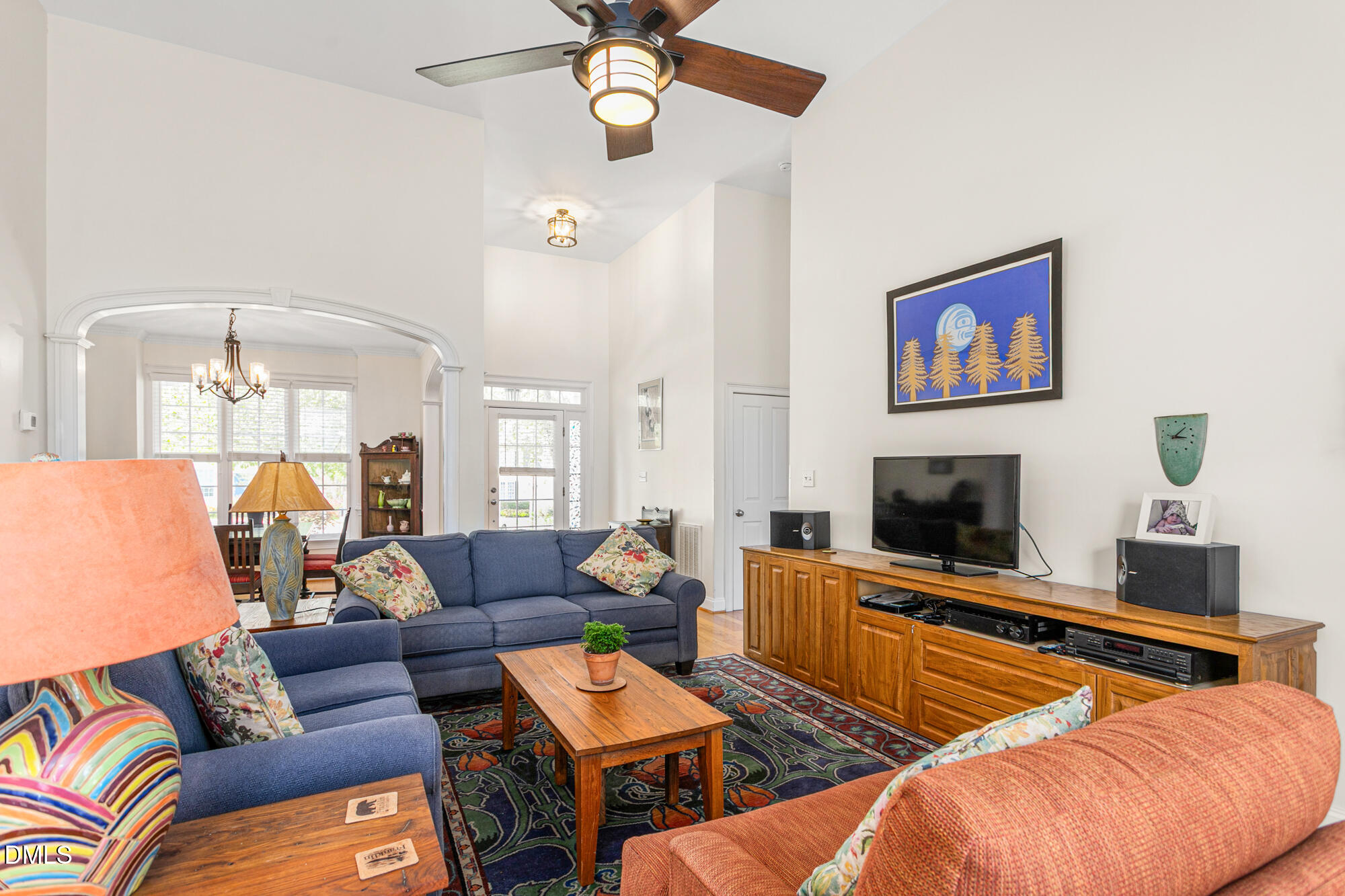 7 Powder Springs Place Durham, NC 27712 - Photo 12 of 44 a living room with furniture fireplace and flat screen tv
