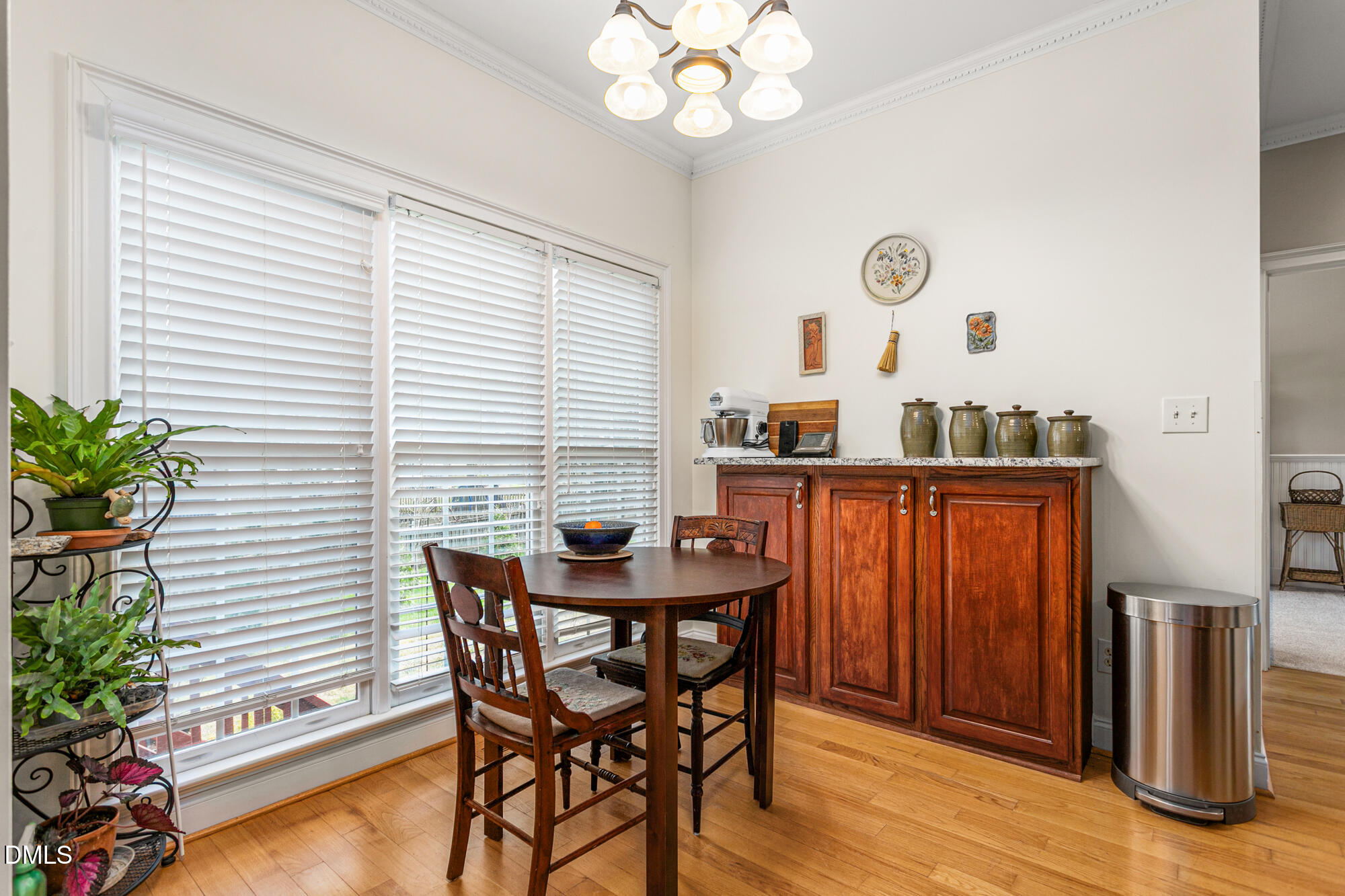 7 Powder Springs Place Durham, NC 27712 - Photo 13 of 44 a view of a dining room with furniture and chandelier