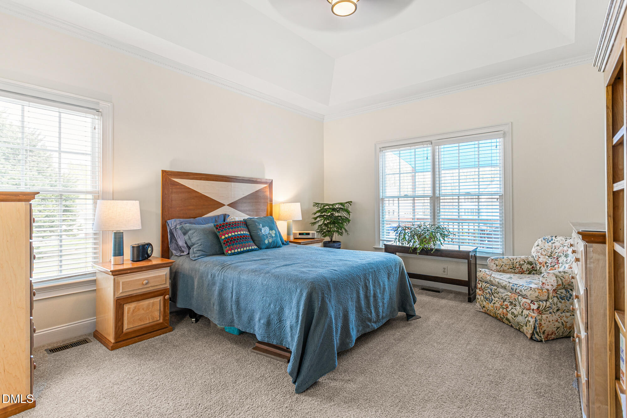 7 Powder Springs Place Durham, NC 27712 - Photo 23 of 44 a bedroom with a bed and a cabinets