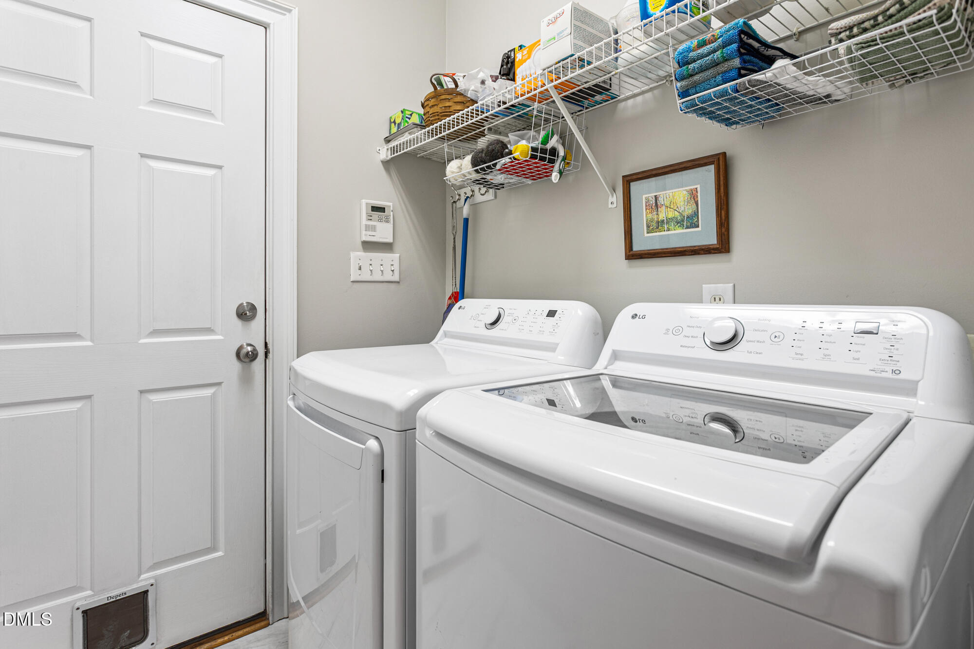 7 Powder Springs Place Durham, NC 27712 - Photo 29 of 44 a utility room with dryer and washer