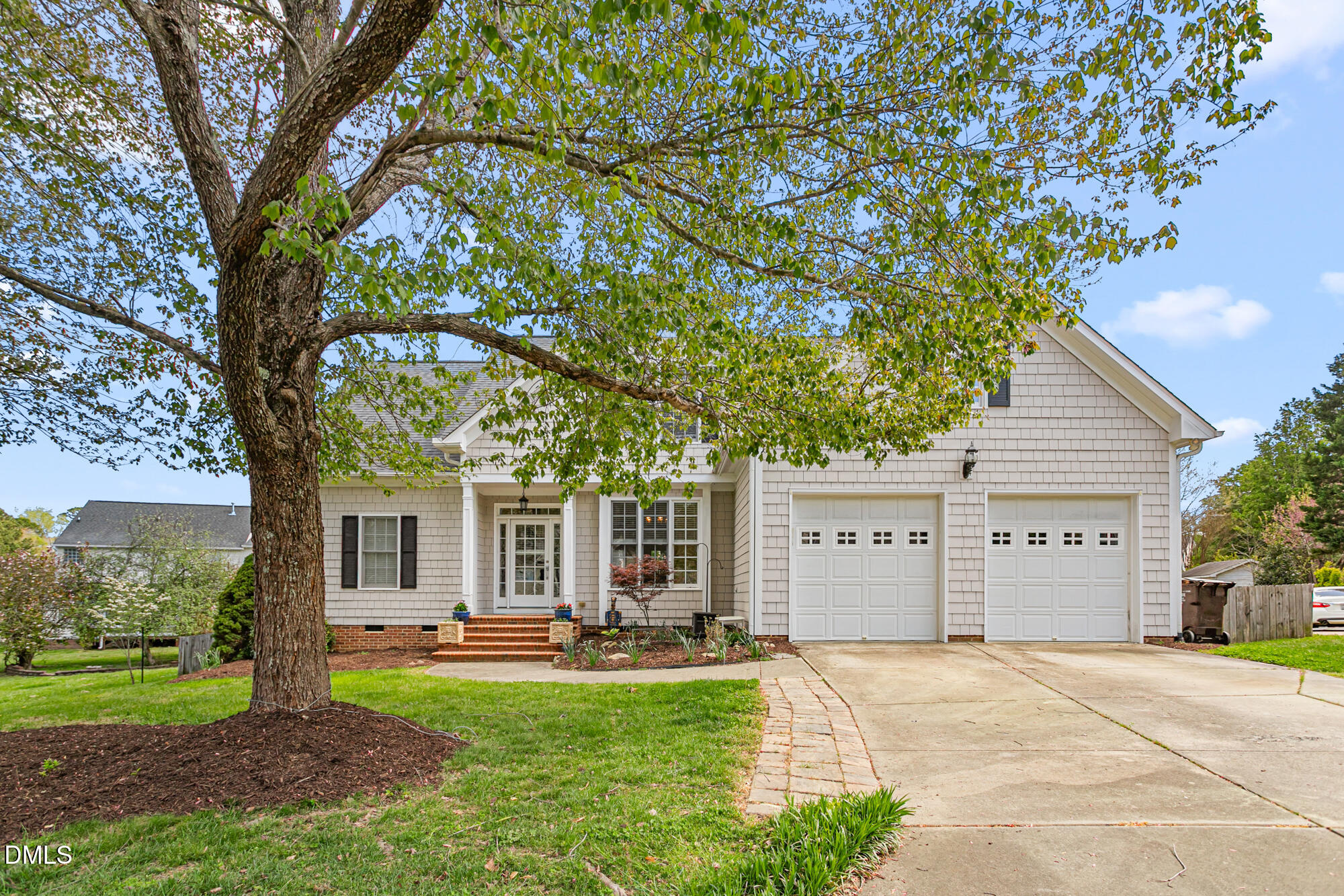 7 Powder Springs Place Durham, NC 27712 - Photo 3 of 44 a view of a house with backyard and a tree