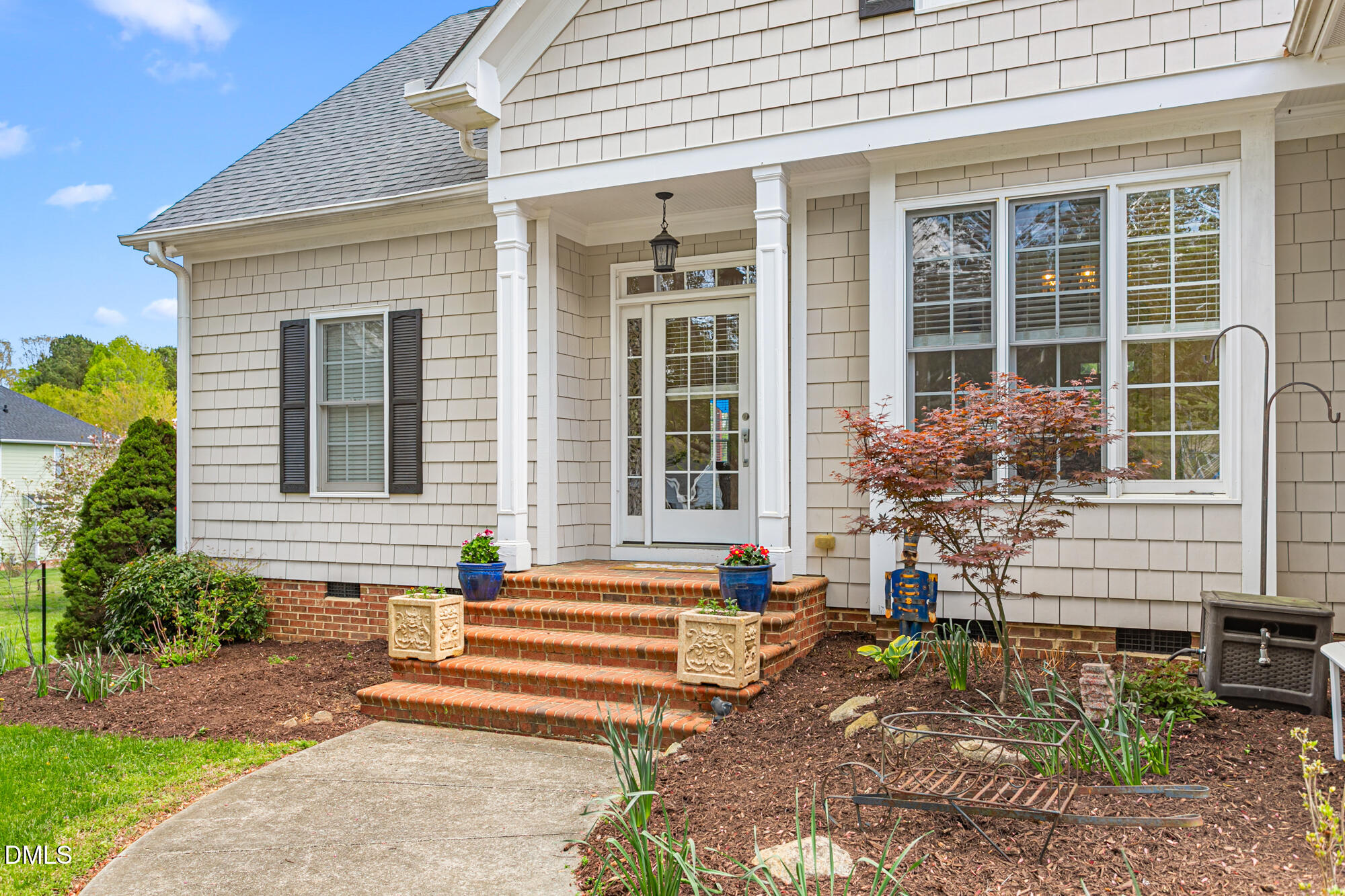 7 Powder Springs Place Durham, NC 27712 - Photo 4 of 44 a front view of a house with outdoor seating