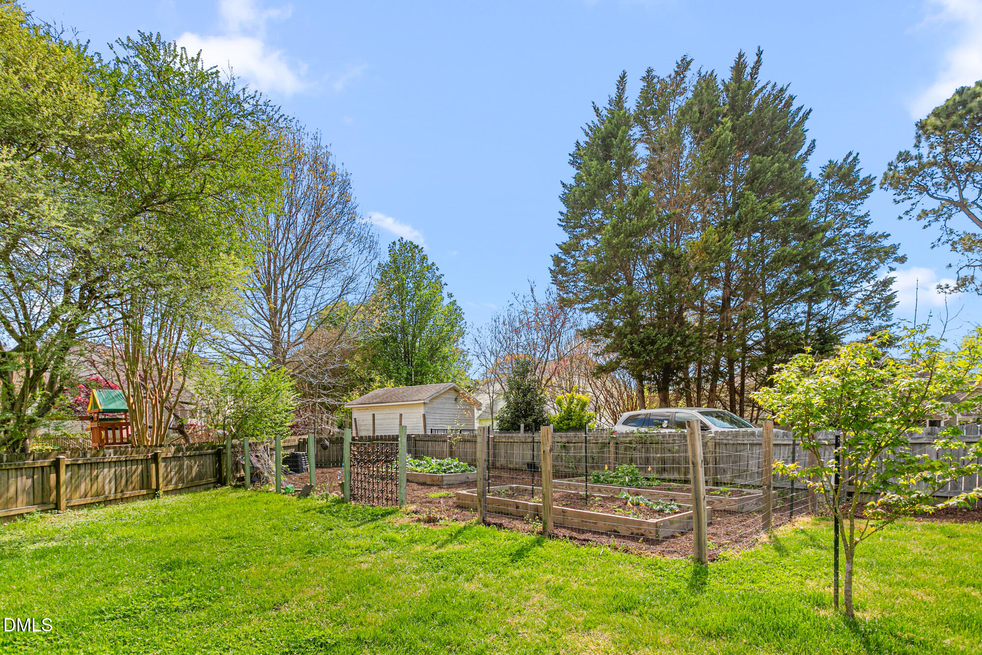 7 Powder Springs Place Durham, NC 27712 - Photo 42 of 44 a view of a house with a yard