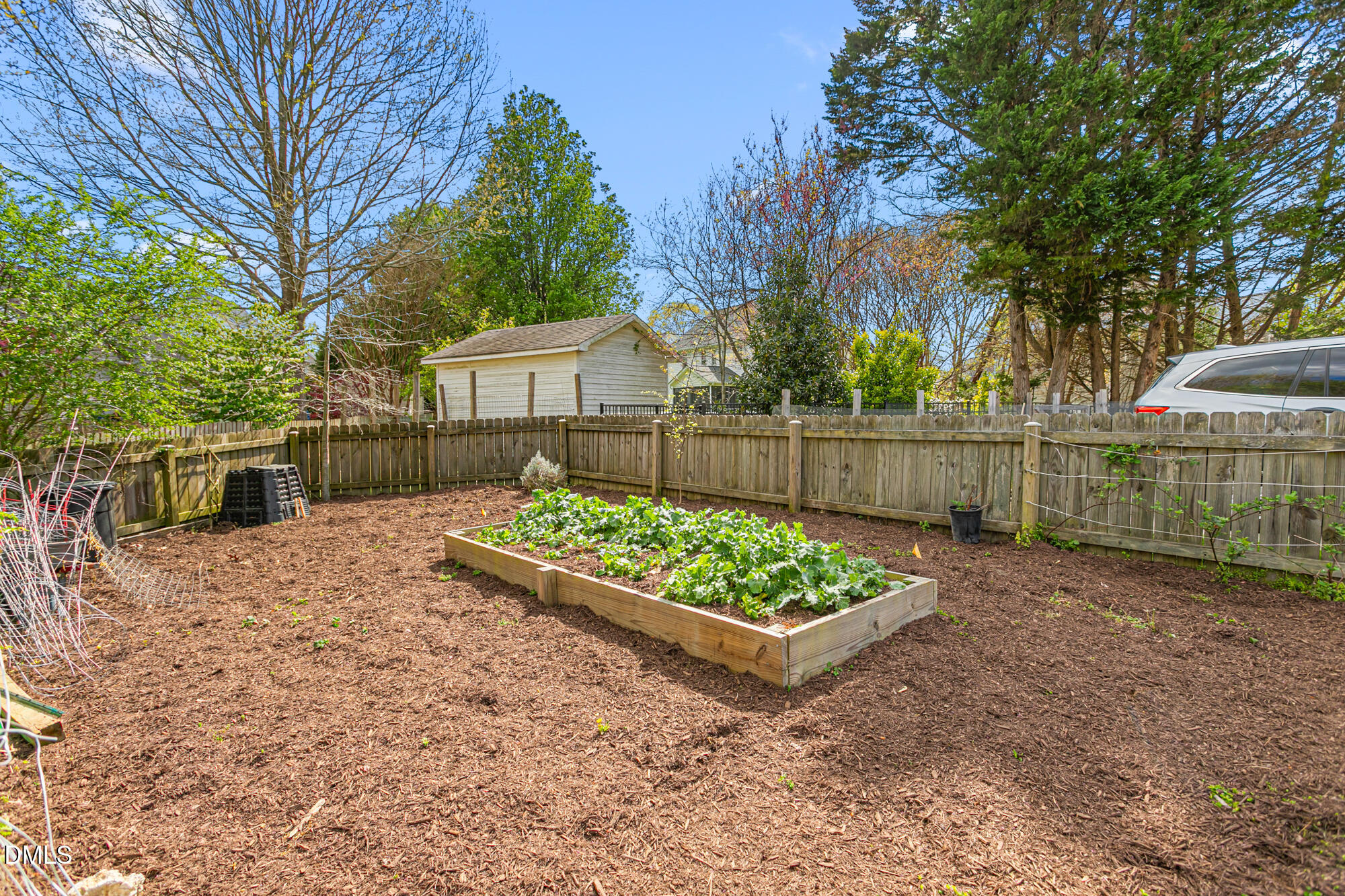 7 Powder Springs Place Durham, NC 27712 - Photo 43 of 44 a view of a backyard with wooden fence
