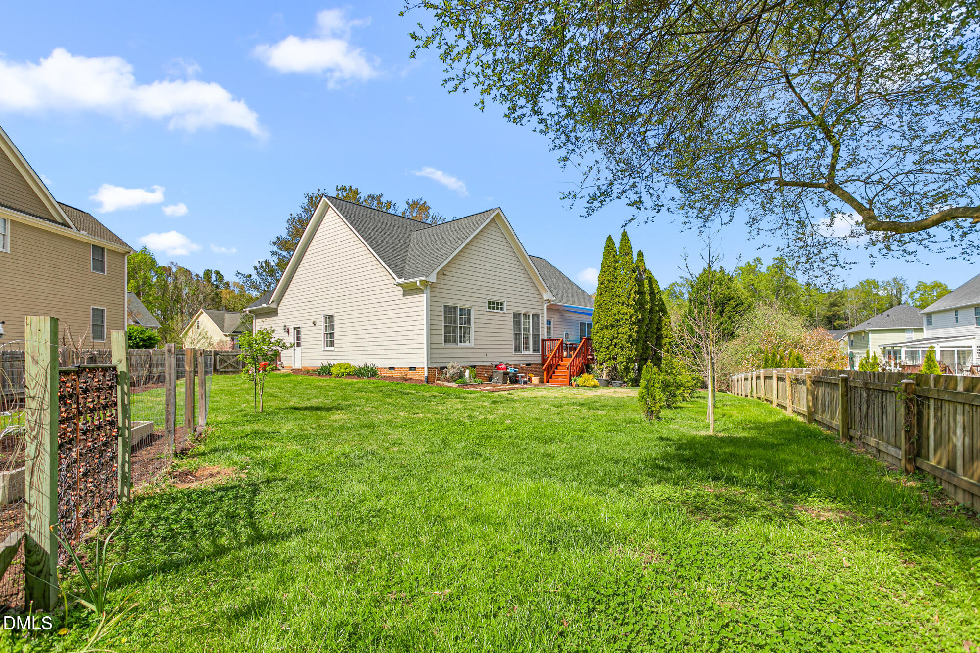 7 Powder Springs Place Durham, NC 27712 - Photo 44 of 44 a view of a backyard with plants and large trees
