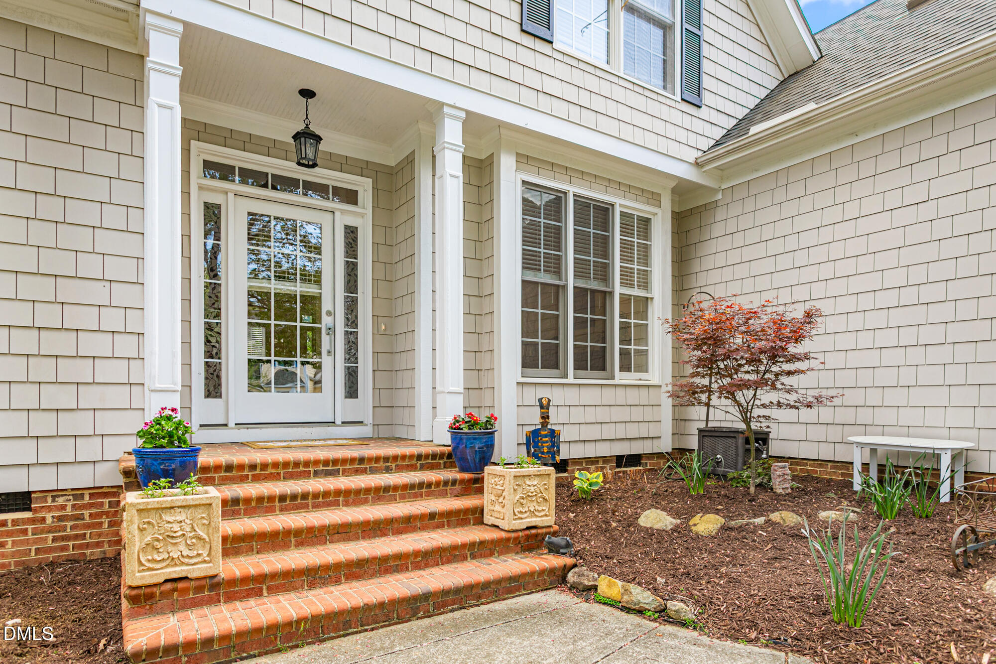 7 Powder Springs Place Durham, NC 27712 - Photo 5 of 44 a front view of a house with a garden