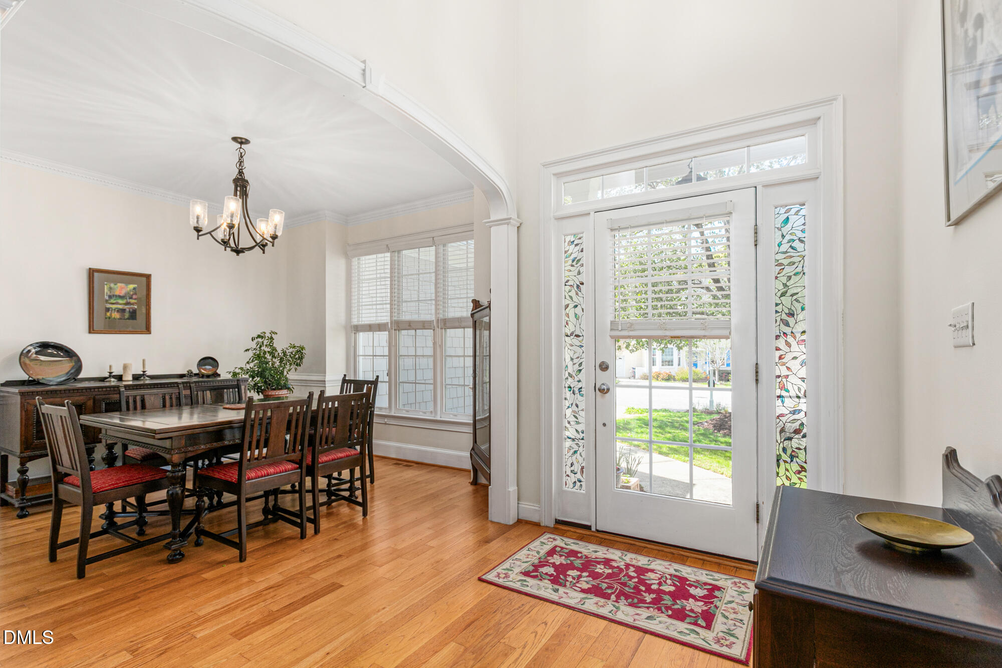 7 Powder Springs Place Durham, NC 27712 - Photo 6 of 44 a view of a dining room with furniture and chandelier