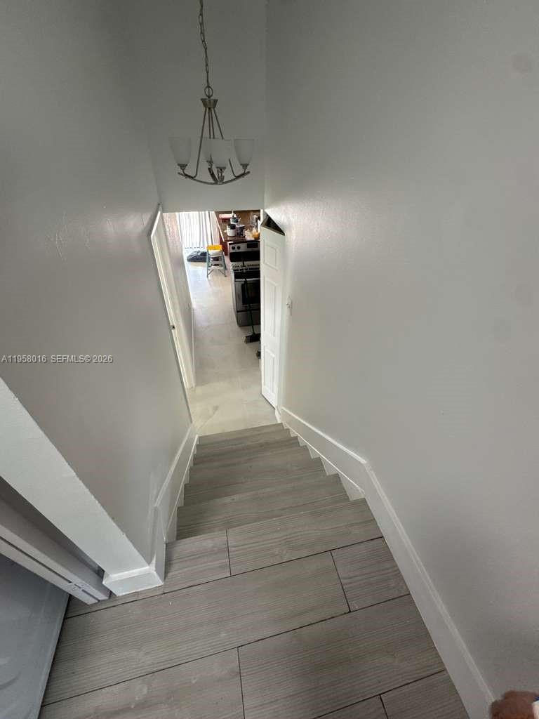 10034 Southwest 221st Street Cutler Bay, FL 33190 - Photo 23 of 25 a view of entryway and kitchen