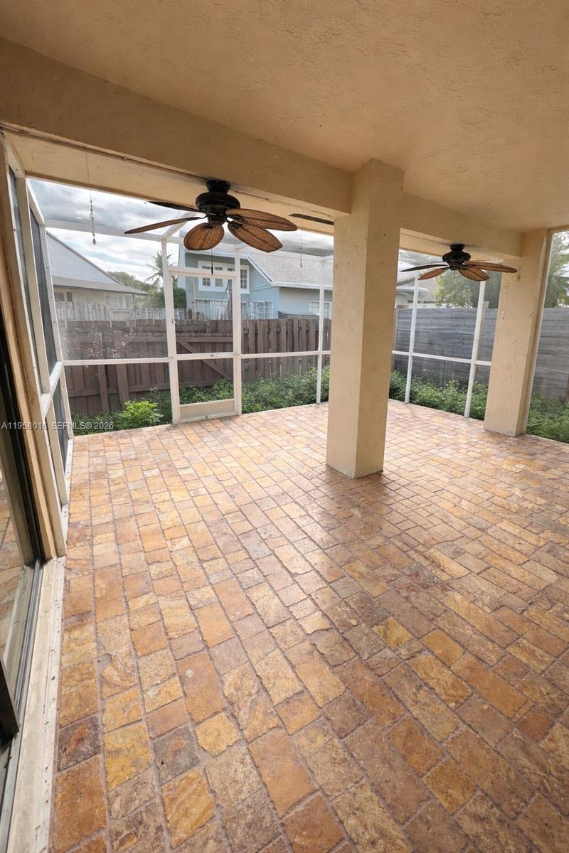 10034 Southwest 221st Street Cutler Bay, FL 33190 - Photo 8 of 25 a view of empty room with windows