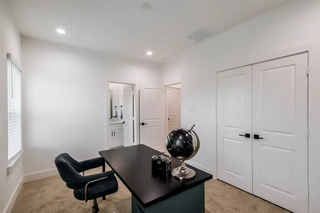 a room with a couch and a window