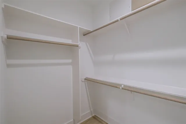 a view of an empty walk in closet