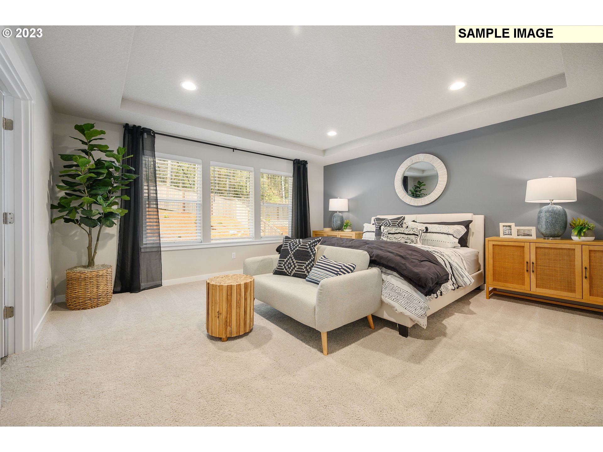 41510 Metolius Avenue, Unit 16 Sandy, OR 97055 - Photo 22 of 40 a bedroom with furniture and a large window