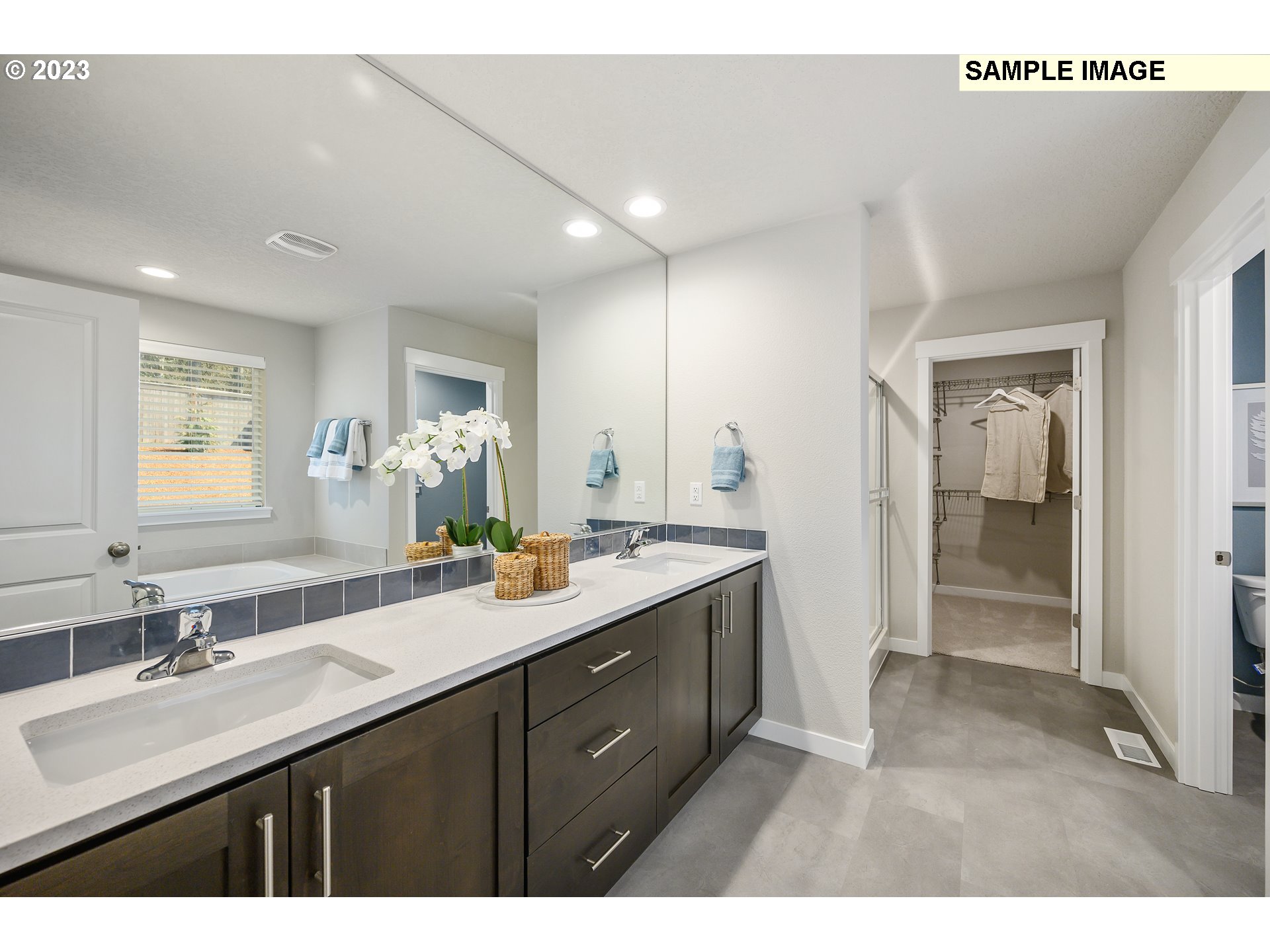41510 Metolius Avenue, Unit 16 Sandy, OR 97055 - Photo 40 of 40 a bathroom with a sink a mirror and a shower