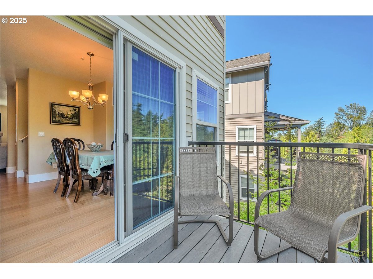 794 Northwest 118th Avenue, Unit 101 Portland, OR 97229 - Photo 20 of 41 a view of a balcony with chair