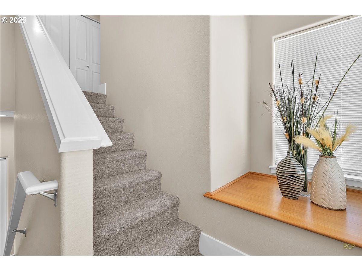 794 Northwest 118th Avenue, Unit 101 Portland, OR 97229 - Photo 21 of 41 a view of entryway and hall with wooden floor