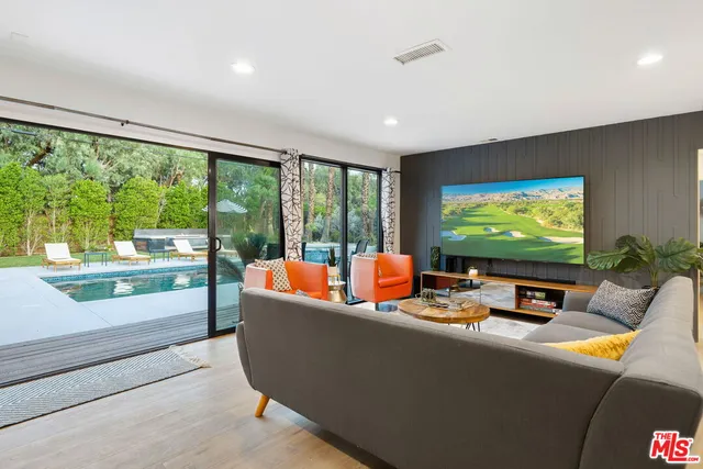 a view of a house with swimming pool