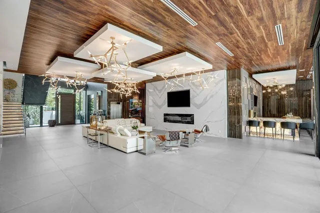 a bathroom with a double vanity sink mirror and shower