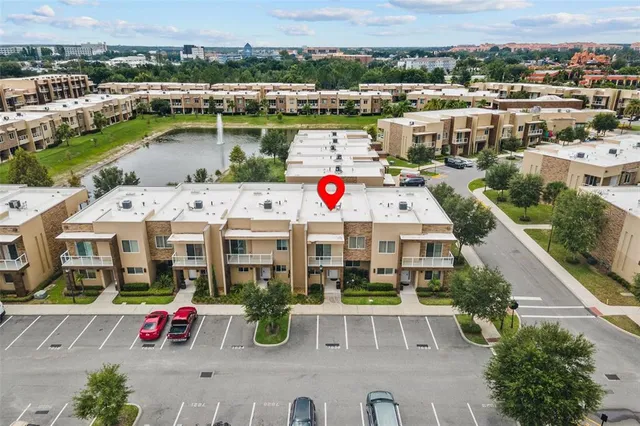 an aerial view of a houses with outdoor space