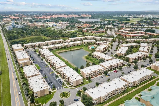 a view of a backyard with a tree