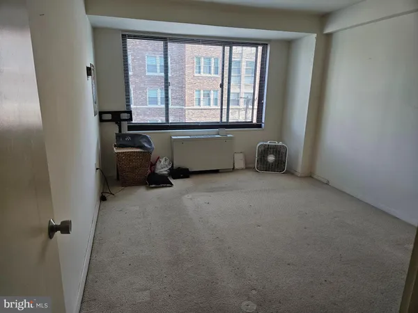 an empty room with a window