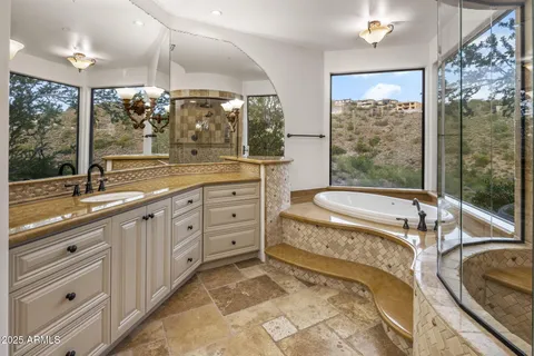 a view of a balcony with an outdoor seating