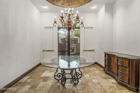 a kitchen that has a sink and a stove