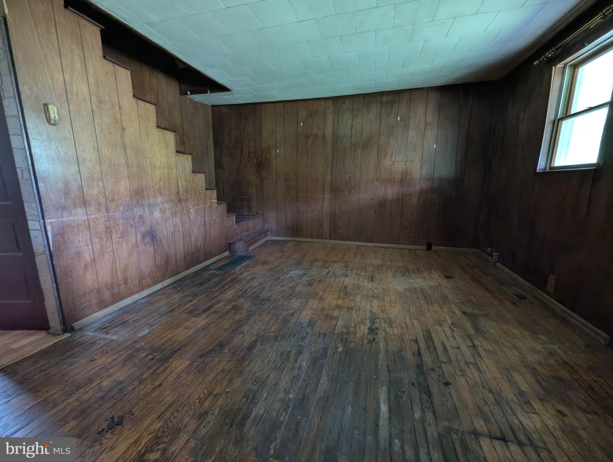 24001 Perry Hill Road Barton, MD 21521 - Photo 25 of 37 a view of a wooden door and wooden floor