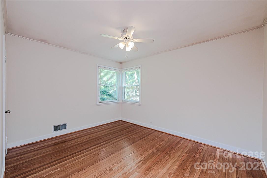 4301 Applegate Road Charlotte, NC 28209 - Photo 15 of 21 wooden floor in an empty room with a window