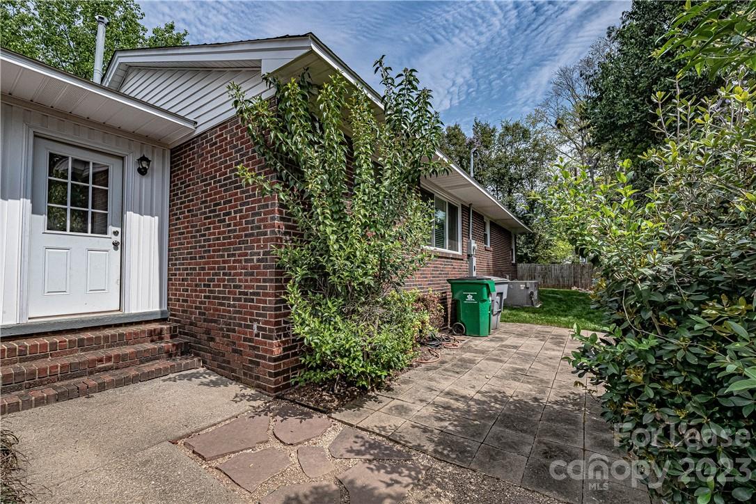 4301 Applegate Road Charlotte, NC 28209 - Photo 19 of 21 a front view of a house with garden