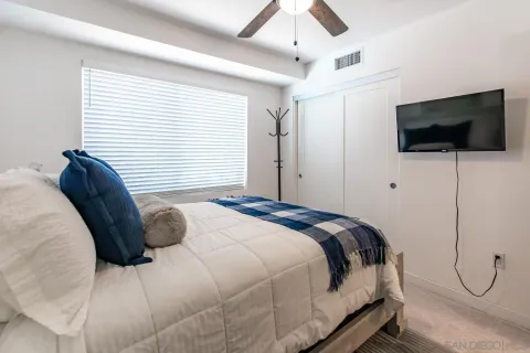 a utility room with washing machine