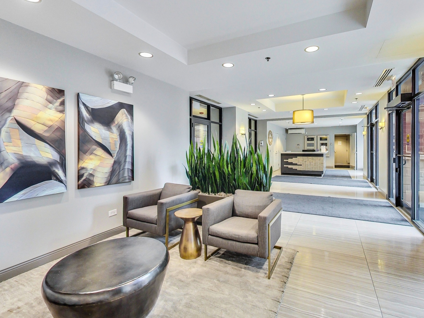 330 North Jefferson Street, Unit 904 Chicago, IL 60661 - Photo 2 of 22 a living room with furniture and a large window