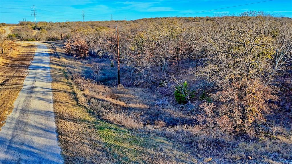 1943 Lakeridge Boulevard Sunset, TX 76270 - Photo 18 of 24 a view of ocean and a yard