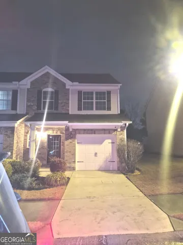 a view of a house with a entertaining space