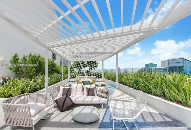 55 Southwest 9th Street, Unit 3609 Miami, FL 33130 - Photo 12 of 21 a view of a patio with furniture