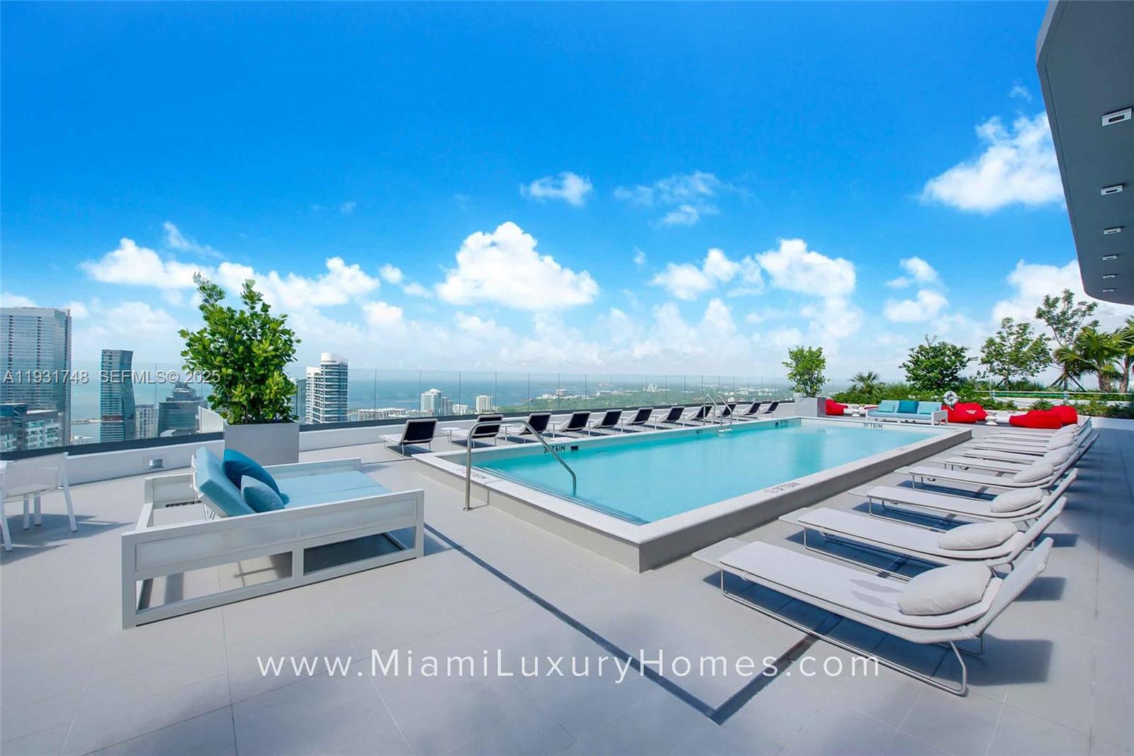 55 Southwest 9th Street, Unit 3609 Miami, FL 33130 - Photo 18 of 21 a view of a patio with couches and a table