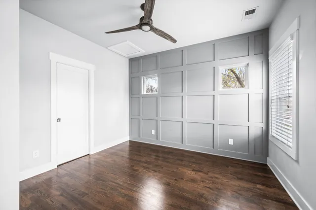 a view of a livingroom with wooden floor