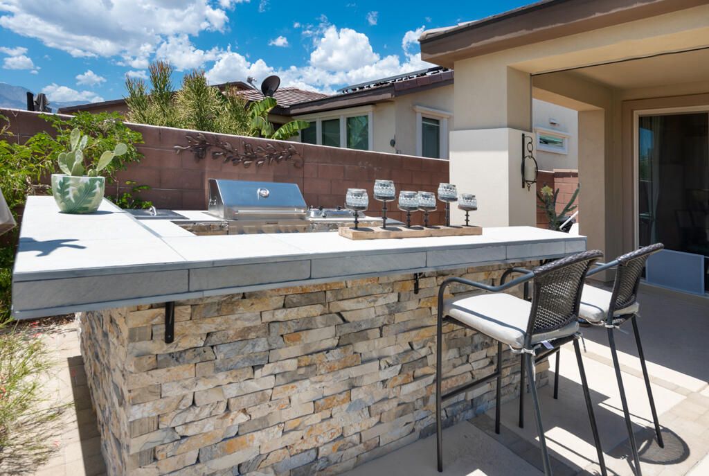 82803 Spirit Mountain Drive Indio, CA 92201 - Photo 28 of 30 a view of a chairs and table in a balcony