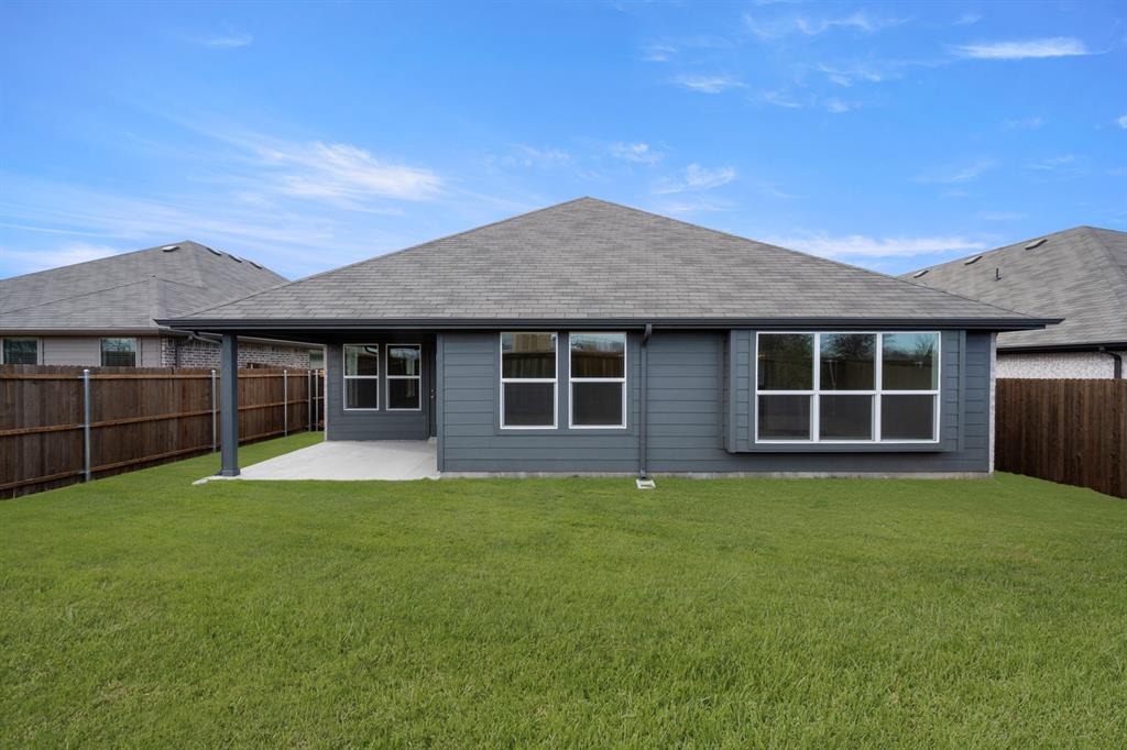 810 Misty Lane Cleburne, TX 76033 - Photo 26 of 30 a house view with a garden space