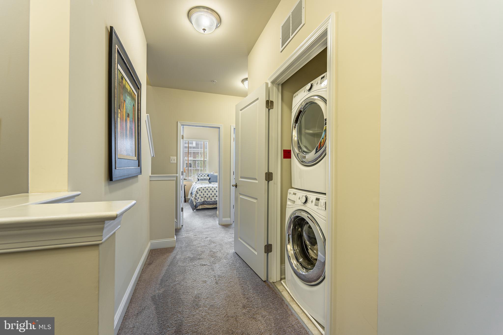 6037 Maple Hill Road Ellicott City, MD 21043 - Photo 33 of 59 BEDROOM LEVEL LAUNDRY CLOSET WITH WASHER & DRYER