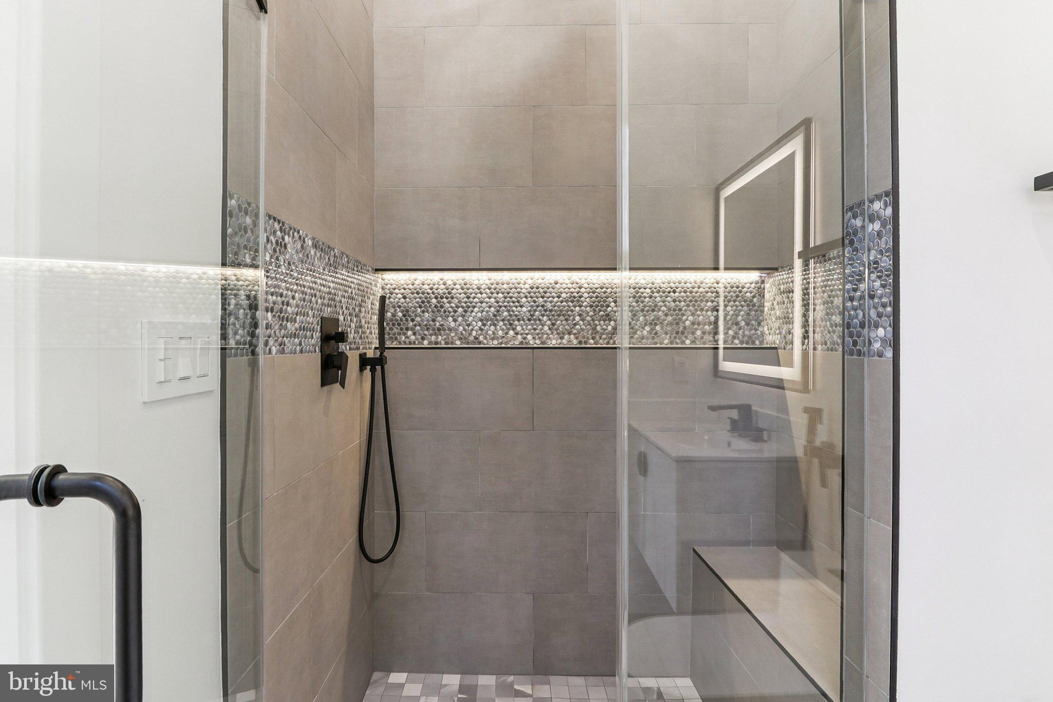 5419 Kempsville Street Springfield, VA 22151 - Photo 28 of 45 a bathroom with a shower