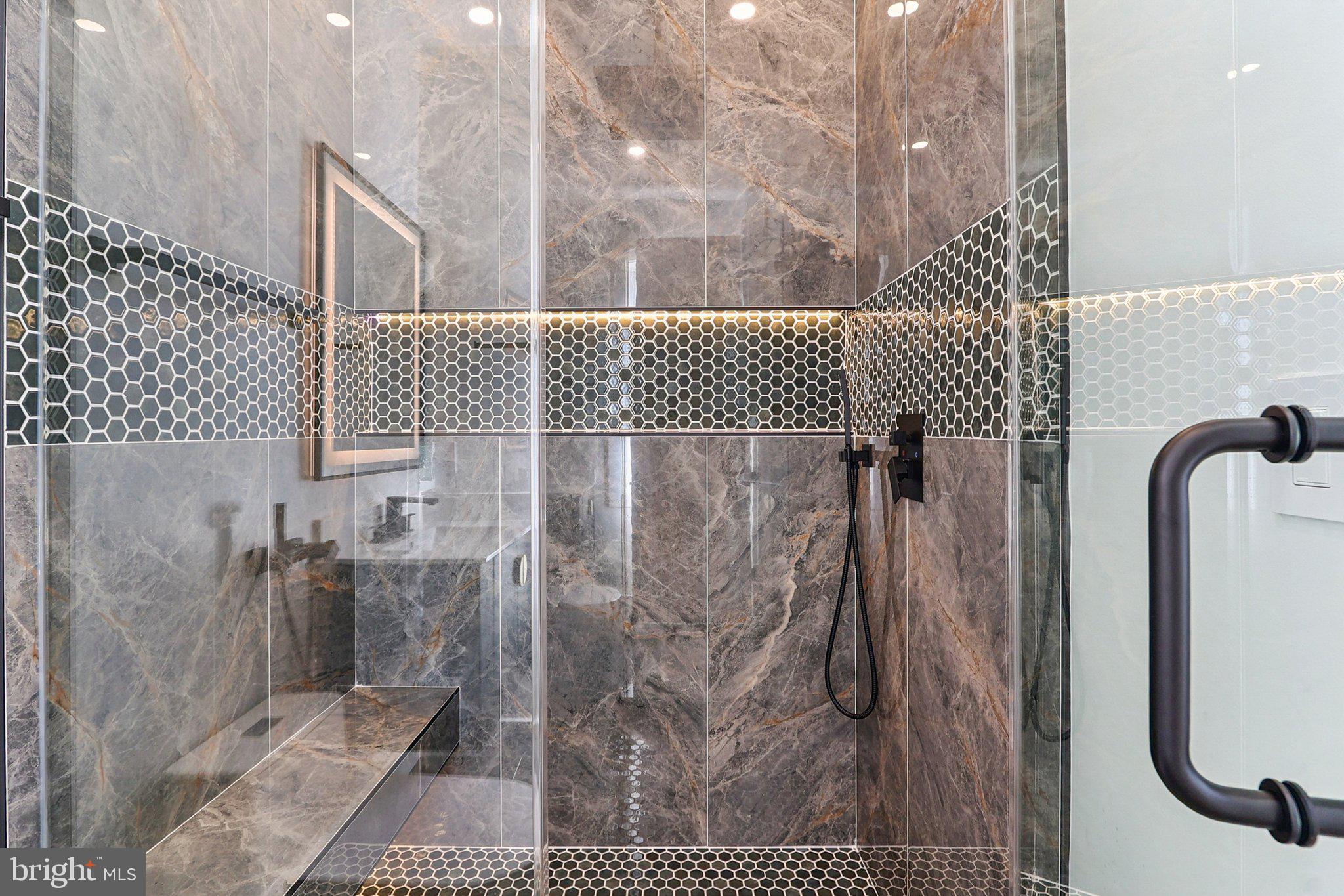 5419 Kempsville Street Springfield, VA 22151 - Photo 33 of 45 a bathroom with a shower