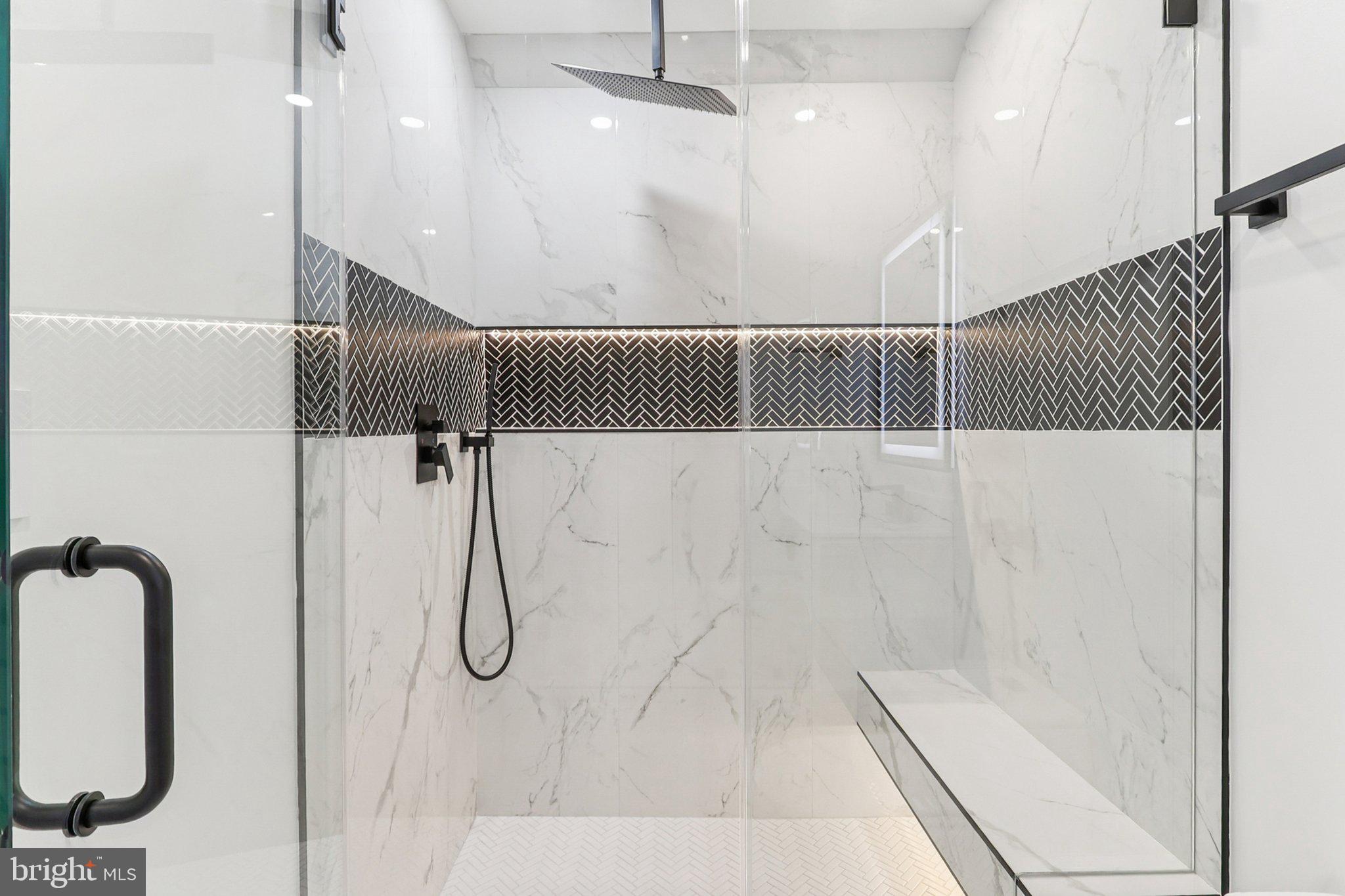 5419 Kempsville Street Springfield, VA 22151 - Photo 42 of 45 a bathroom with a shower